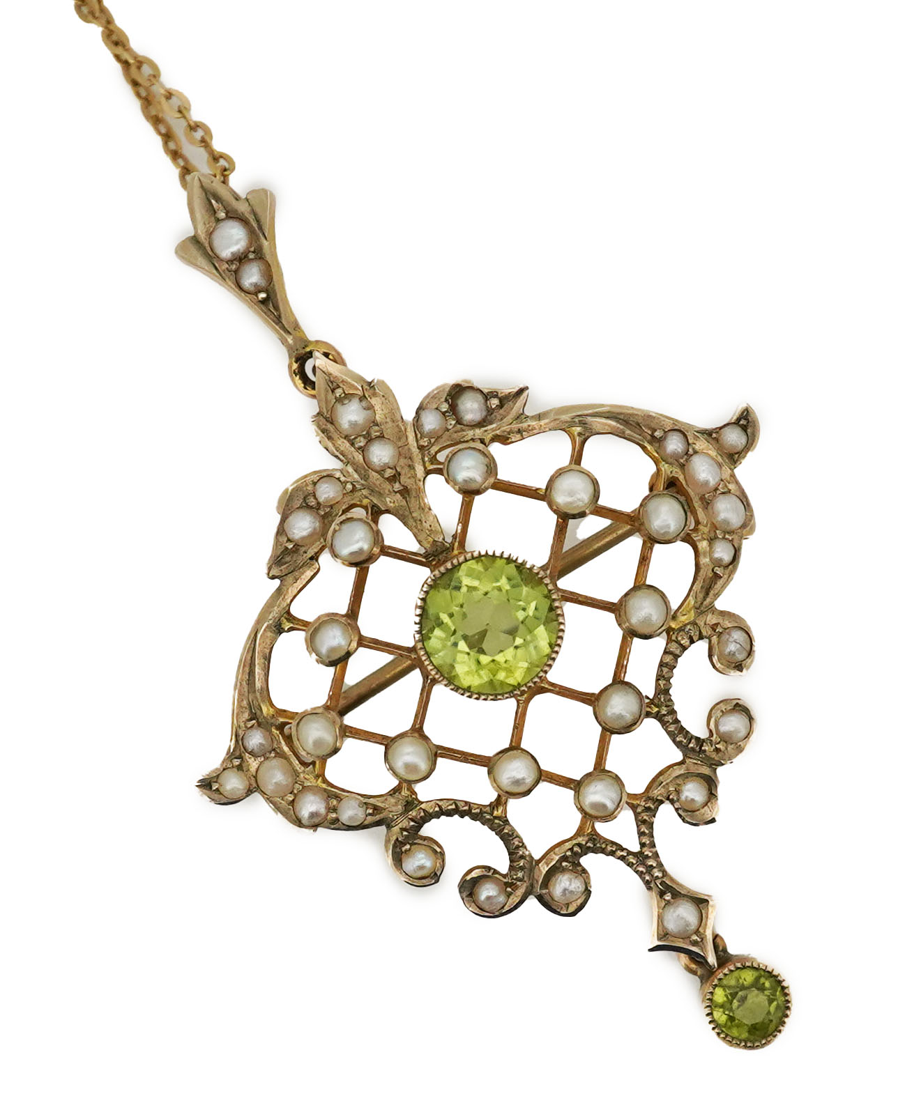 An Edwardian peridot and seed pearl pendant/brooch, early 20th century